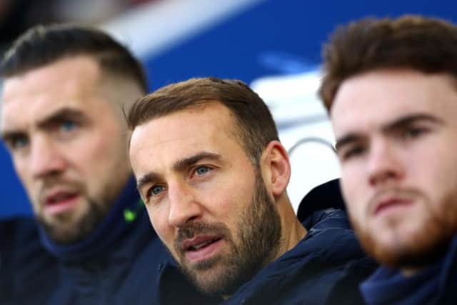Brighton striker Glenn Murray looks on from the bench as the Seagulls take on Sheffield United on EPL duty