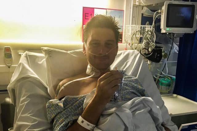 Adam Martin, 41, was "on death's door" after the deadly infection attacked his heart and left him fighting for life. Picture: SWNS