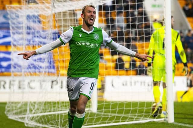 Christian Doidge celebrates his hat-trick in Hibs' defeat of St Johnstone in November last year.