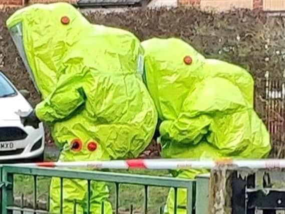 Officers in hazmat suits sealed off a street in south Manchester on Saturday morning following concerns for the welfare of the man.
