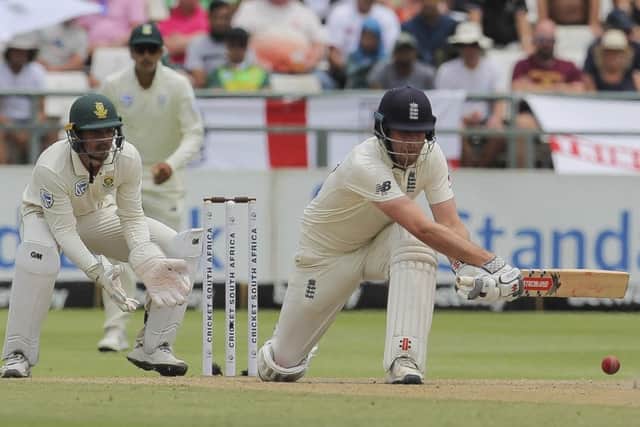 Dom Sibley plays a sweep on his way to 133 not out during the fourth day of the second Test at Cape Town. Picture: AP.