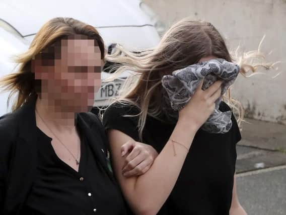 The 19-year-old woman hugged her family and legal team and left court weeping, with her head in her hands, after she was sentenced for public mischief.