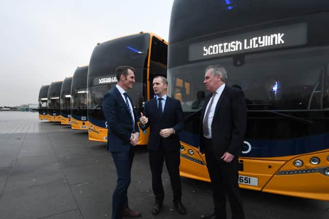 Transport secretary Michael Matheson, centre, launching the new fleet. Picture: John Devlin