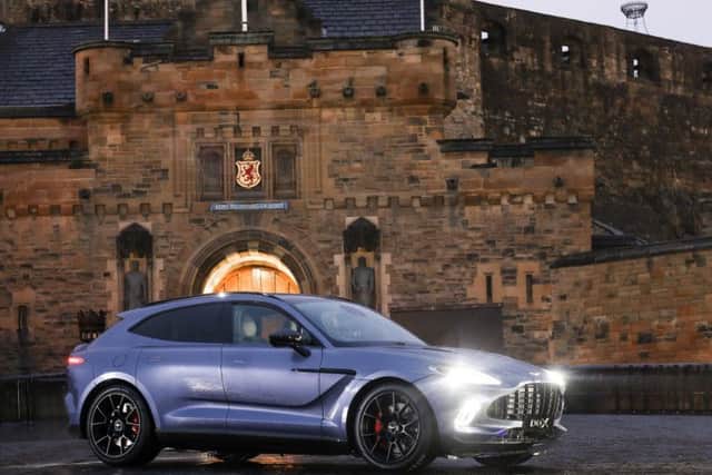 Aston Martin recently launched its latest model, the DBX, pictured at Edinburgh Castle. Picture: Contributed