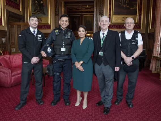 Speaker of the House Lindsay Hoyle (second right) and Home Secretary Priti Patel with Parliamentary security staff and Met Police officer Habibi Syaaf, who rescued a man from the River Thames