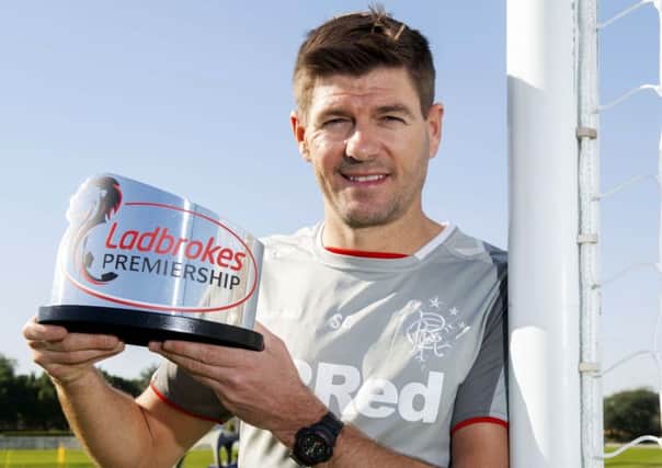 Rangers manager Steven Gerrard with his Ladbrokes Premiership Manager of the Month award for December at the club's training camp in Dubai. Picture: Craig Foy/SNS
