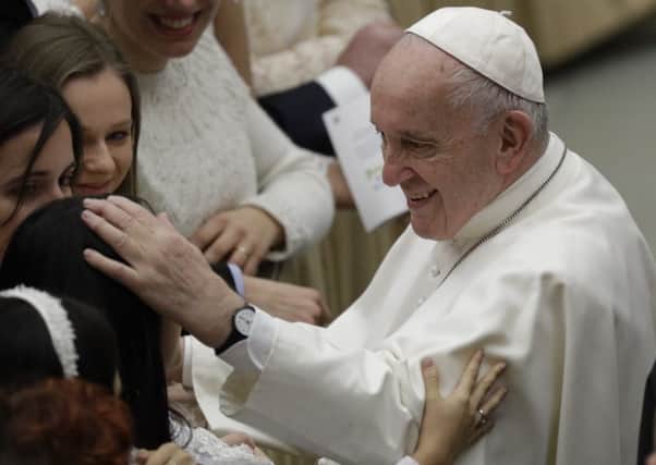 The trio branded Pope Francis a 'heretic'. Picture: AP Photo/Gregorio Borgia