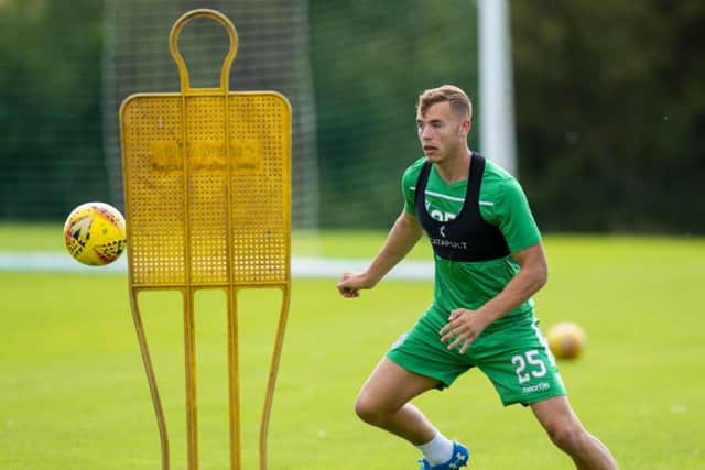Ryan Porteous says Hibs will be aiming to climb the Premiership table after the winter break. Picture: Ross MacDonald/SNS