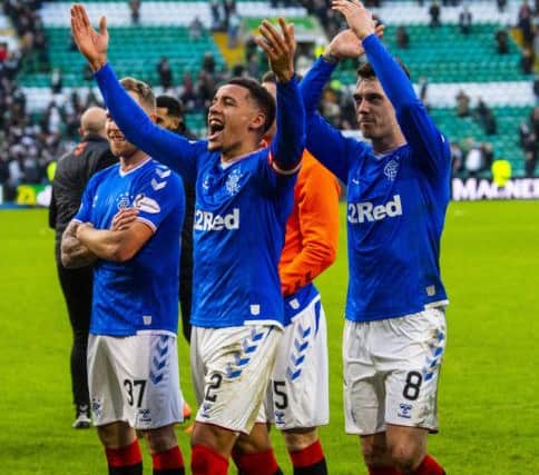 James Tavernier, centre, celebrates in front of the Rangers fans after his sides 2-1 league win at Celtic Park before the winter break. Picture: Rob Casey/SNS