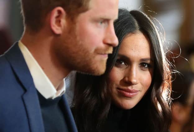 The Duke and Duchess of Sussex during a reception for young people at the Palace of Holyroodhouse in 2018. Picture: PA