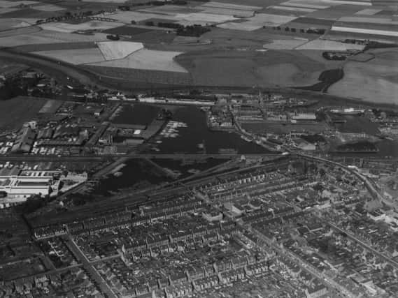 Almost all these houses in Grangemouth, pictured here in 1948, were demolished to make way for a massive expansion of the town driven by its new industrial prosperity. PIC: HES.