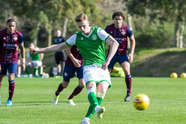 Oli Shaw strokes home his penalty in the friendly against Willem II. Picture: Ross Parker/SNS