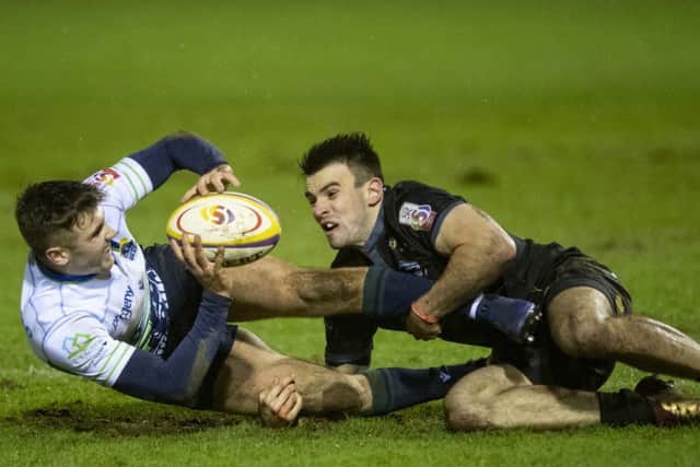Glen Faulds of Boroughmuir Bears is tackled by Joseph Jenkins during their clash with Southern Knights at Meggetland last night. Picture: SNS/SRU.