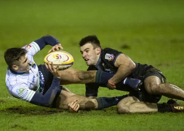 Glen Faulds of Boroughmuir Bears is tackled by Joseph Jenkins during their clash with Southern Knights at Meggetland last night. Picture: SNS/SRU.