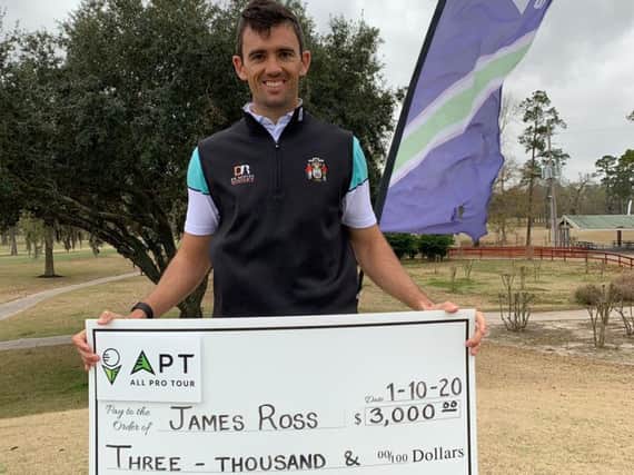 James Ross shows off his cheque after winning on the All Pro Golf Tour in Texas