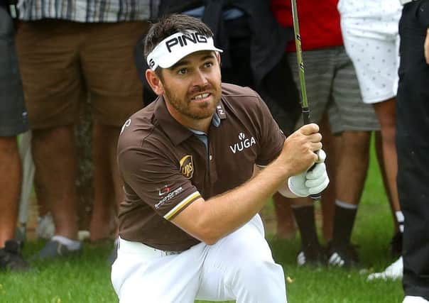 Louis Oosthuizen of South Africa plays his second shot into the 16th green. Picture: Warren Little/Getty Images