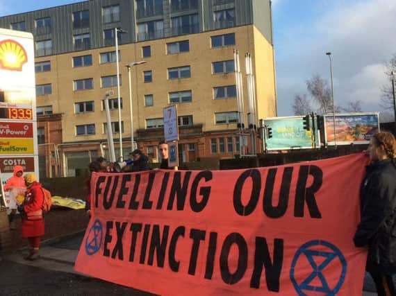 Extinction Rebellion activists block Shell petrol station in latest protest