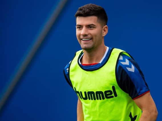 Steven Gerrard has urged Jordan Jones to force his way into the starting XI