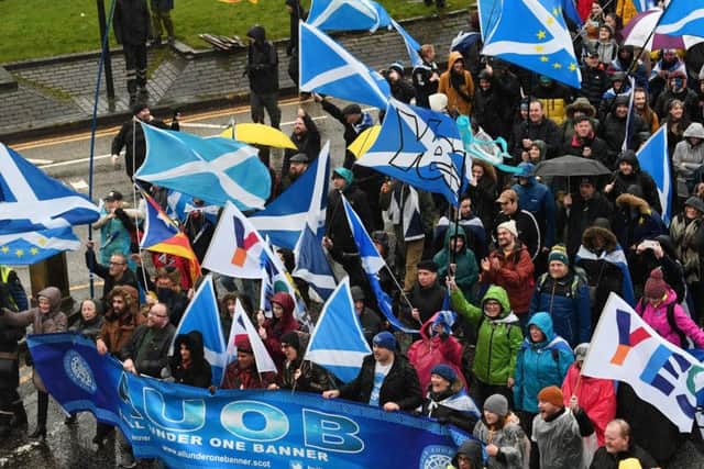 A mass pro-independence march makes its way through Charing Cross in Glasgow on Saturday. Picture: John Devlin