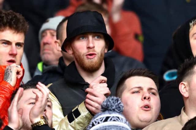 Oli McBurnie is seen among the Swansea fans at the south Wales derby on Sunday