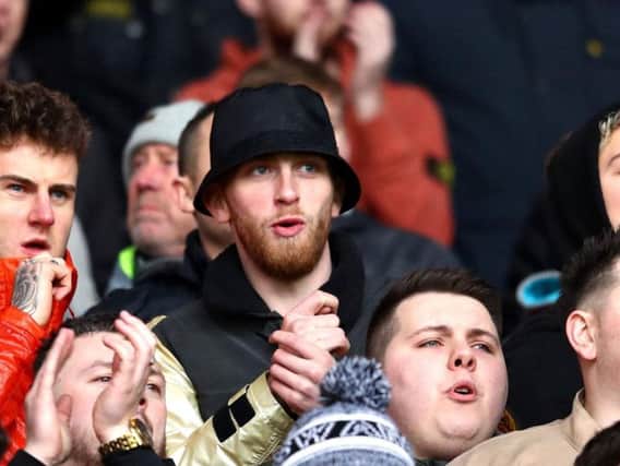 Oli McBurnie is seen among the Swansea fans at the south Wales derby on Sunday