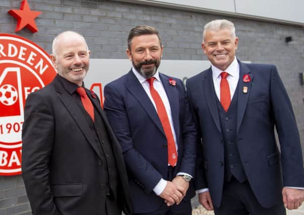 From left, Stewart Milne, Derek McInnes and Dave Cormack. McInnes says 
that the three of them still operate closely together.