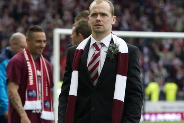 Jamie Hamill joins in the celebrations after Hearts' 5-1 win over Hibs in the 2012 Scottish Cup final
