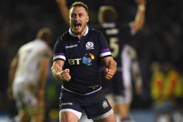 Stuart Hogg celebrates victory over  England at Murrayfield in February, 2018