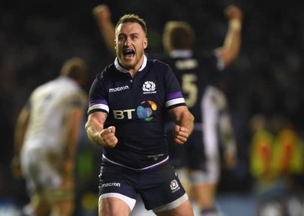 Stuart Hogg celebrates victory over  England at Murrayfield in February, 2018