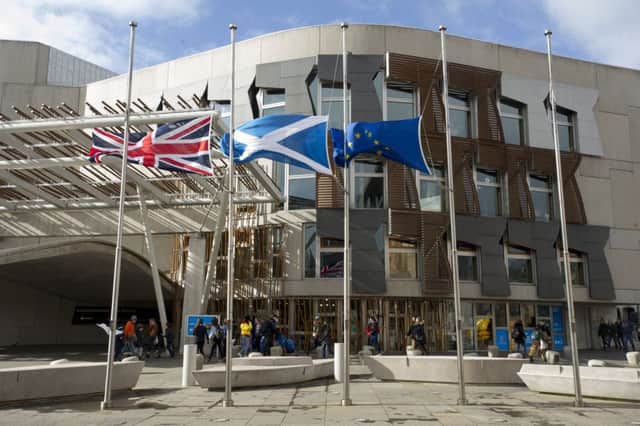 The flag of the EU is at present flown alongside the Union Jack and Saltire outside the Holyrood building. Picture: Ian Rutherford