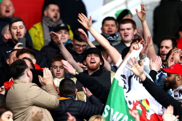 Oli McBurnie among the Swansea fans during their recent derby match against Cardiff City. Picture: Getty.