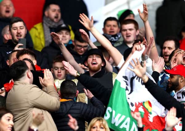 Oli McBurnie among the Swansea fans during their recent derby match against Cardiff City. Picture: Getty.