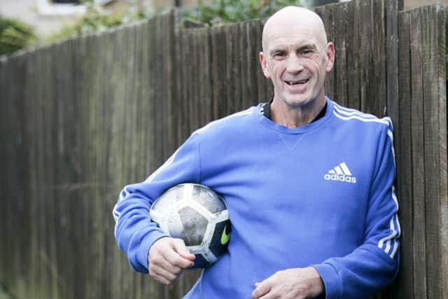 John Martin, now 61 and still living in Prestonpans, helps coach local youth team Musselburgh Windsor and works in Tesco. Picture: Alistair Linford