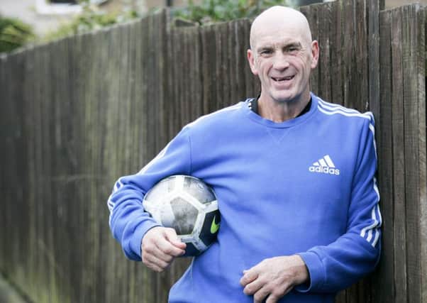 John Martin, now 61 and still living in Prestonpans, helps coach local youth team Musselburgh Windsor and works in Tesco. Picture: Alistair Linford