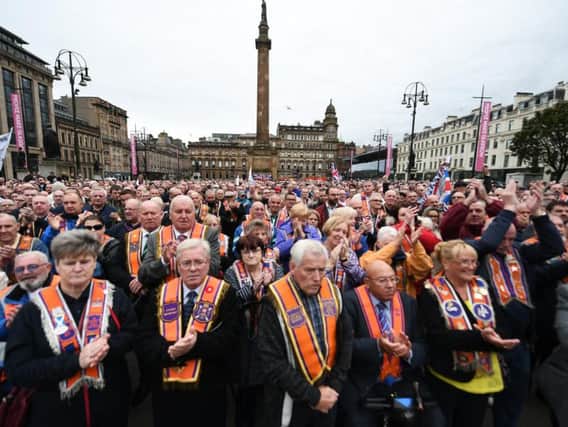 Loyalist groups gathered to protest against Glasgow city council's decision to ban some marches last year by loyalist and republican groups amid fears over sectarian disorder.