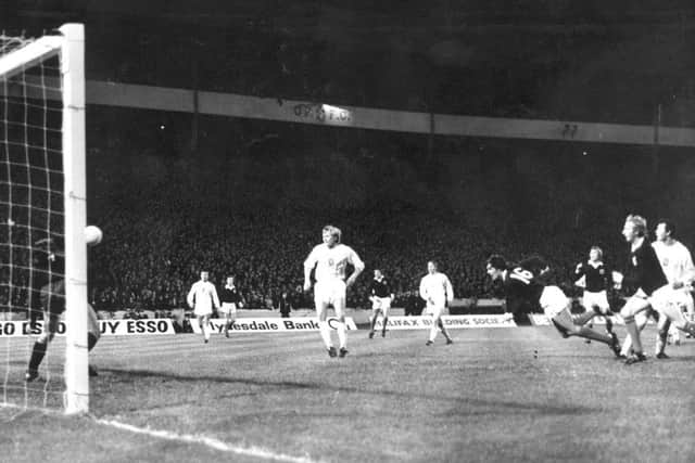 Joe Jordan heads home against Czechoslovakia, the goal which took Scotland to the 1974 World Cup. Picture: Getty Images