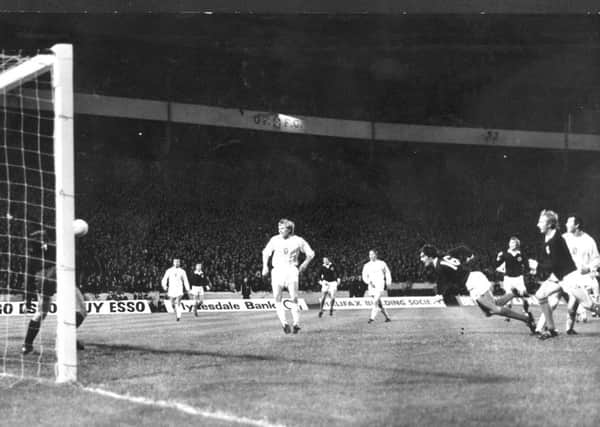 Joe Jordan heads home against Czechoslovakia, the goal which took Scotland to the 1974 World Cup. Picture: Getty Images