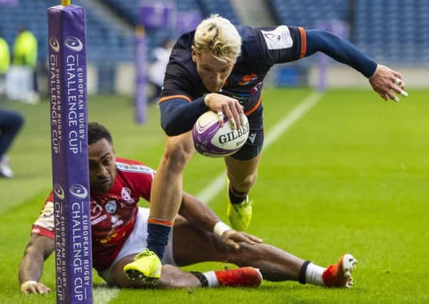 Edinburgh's Darcy Graham runs in for his hat-trick try in the win over Agen at BT Murrayfield. Picture: Paul Devlin / SNS