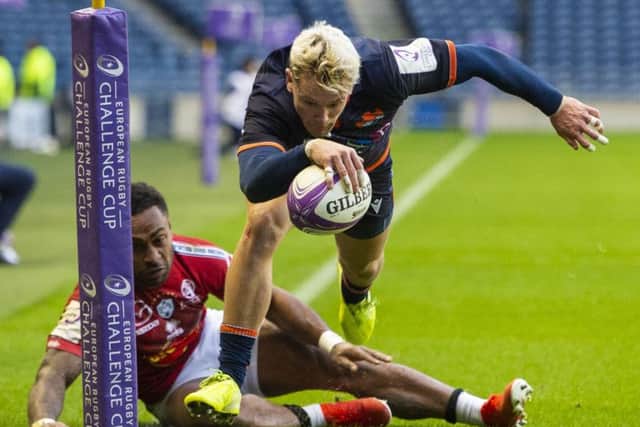 Edinburgh's Darcy Graham runs in for his hat-trick try in the win over Agen at BT Murrayfield. Picture: Paul Devlin / SNS