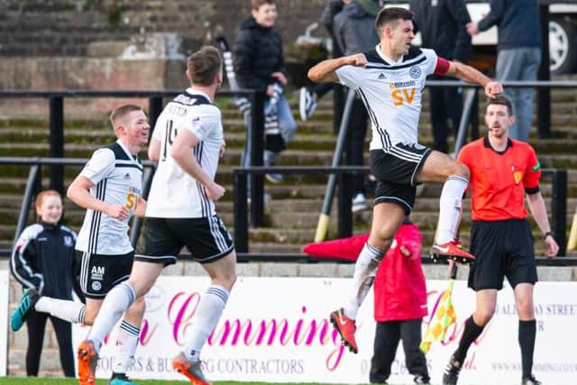 Steven Bell celebrates his goal for Ayr.