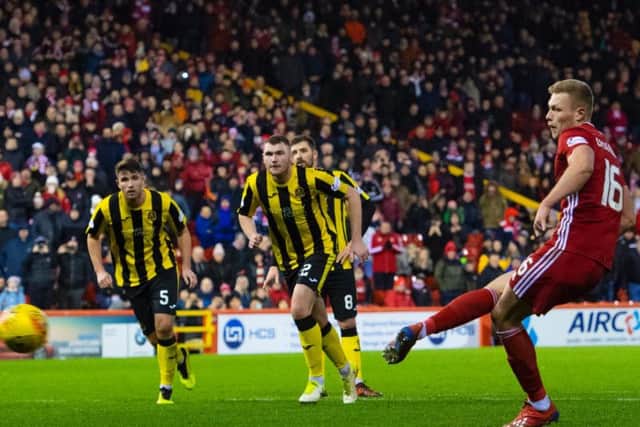 Sam Cosgrove scores the winner for Aberdeen.
