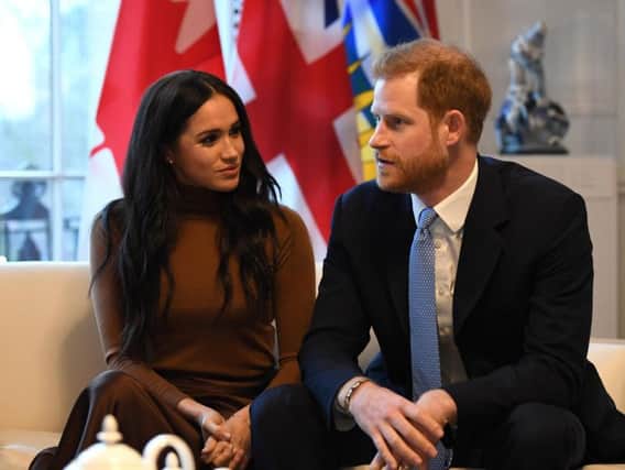 Harry and Meghan will step back from royal duties in the spring