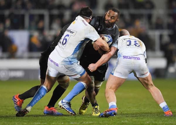 Glasgow Warriors' Leone Nakarawa scored an early try but is tackled here by Sale Sharks' Rob Webber and Jake Cooper-Woolley. Picture: Dave Howarth/PA