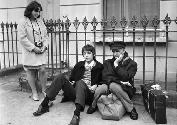 Ivor Cutler, the sixth or seventh Beatle, and Paul McCartney wait for their tour bus in London in 1967 (Picture: Jim Gray/Keystone Features/Getty Images)