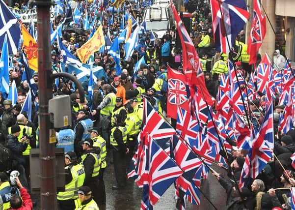 A nation divided: nationalist and unionist protesters take to the streets in Glasgow (Picture: John Devlin)