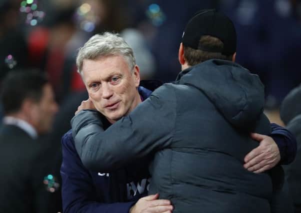 It's not possible to say for sure, but this photograph of Liverpool manager Jurgen Klopp embracing David Moyes, manager of West Ham, perhaps suggests the latter shares Kevan Christie's attitudes to hugging (Picture: Julian Finney/Getty Images)