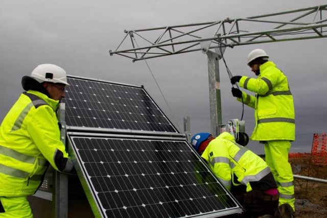 Solar panels and a pole with MBPs camera equipment being erected. Picture: contributed.