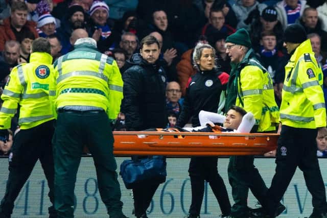 Kyle Magennis is carried off on a stretcher. Picture: SNS