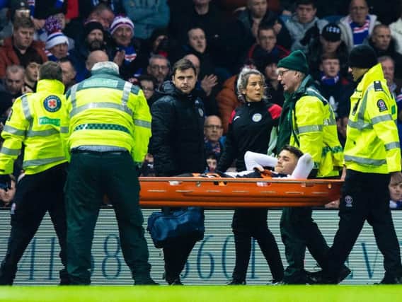 Kyle Magennis is carried off on a stretcher. Picture: SNS