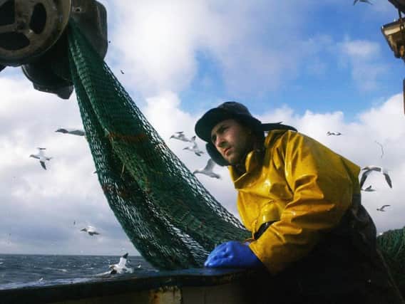 Scotland's fishing industry could be "traded" to protect the UK's financial services sector MSPs have heard.